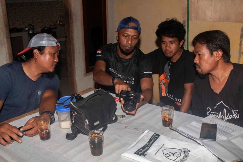 guys-at-table-darkened.jpg