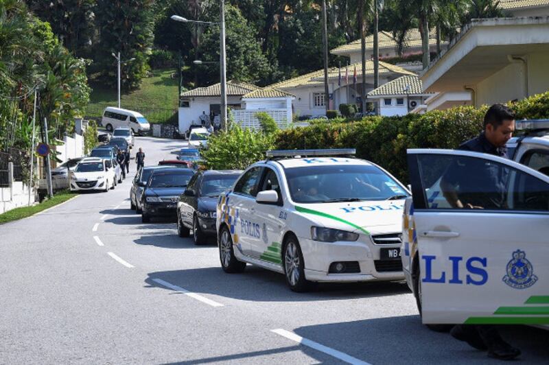 Police cars are seen outside the home of former Malaysian Prime Minister Najib Razak, at Jalan Langgak Duta in Kuala Lumpur, May 17, 2018. [S.Mahfuz/BenarNews]