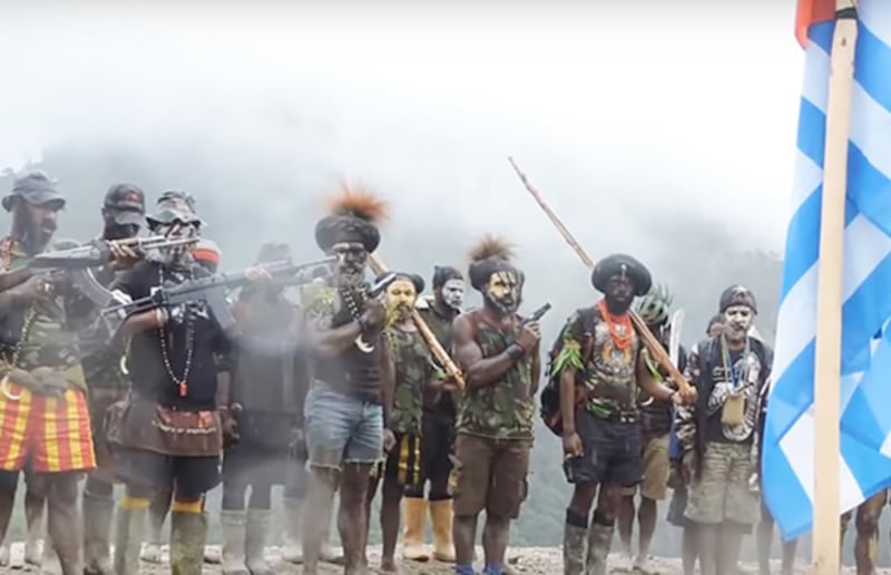 Guerrillas from the West Papuan National Liberation Army (TPNPB), the military wing of the Free Papua Movement, stand in formation in Indonesia's Papua province, in this photo provided by the group's spokesman, Sebby Sembom, January 2018.