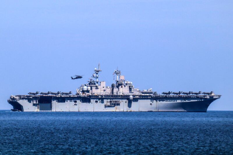A helicopter lands on the USS Wasp during an annual joint training exercise in the western Philippine province of Zambales, April 11, 2019. [Jay Rey/BenarNews]