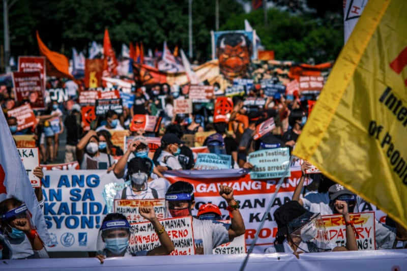 Protesters rally at the University of the Philippines in Manila to denounce policies by President Rodrigo Duterte, July 27, 2020. [Luis Liwanag/BenarNews]