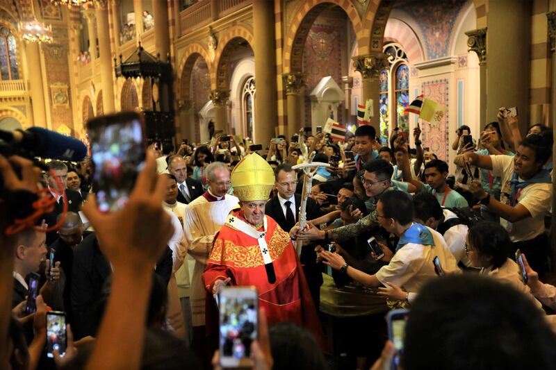 Pope Francis leaves after celebrating Mass at the Assumption Cathedral, in Bangkok, Nov. 22, 2019. [AP]