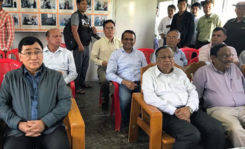 Bangladesh's Foreign Minister Abdul Hassan Mahmood Ali (front row, 2nd from R) sits in an office during a visit to western Myanmar's Rakhine state, Aug. 11, 2018. [Bangladesh's Ministry of Foreign Affairs]