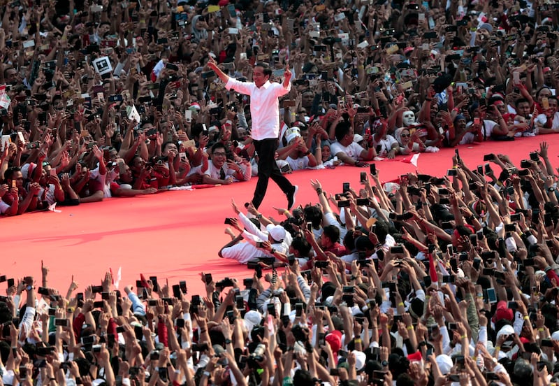 Presiden Joko “Jokowi” Widodo, dalam kampanye pemilihan presiden di Stadion Gelora Bung Karno, Jakarta, 13 April 2019. [Dita Alangkara/AP]