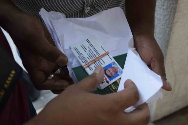 Pasport Bangladesh dan pas lawatan kerja sementara palsu yang dirampas dalam serbuan Jabatan Imigresen Malaysia di Kuala Lumpur, 12 September, 2019.