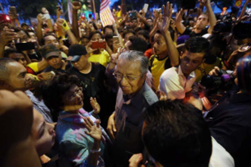Former Malaysian Prime Minister Mahathir Mohamad joins the Bersih rally in Kuala Lumpur, Aug. 29, 2015.