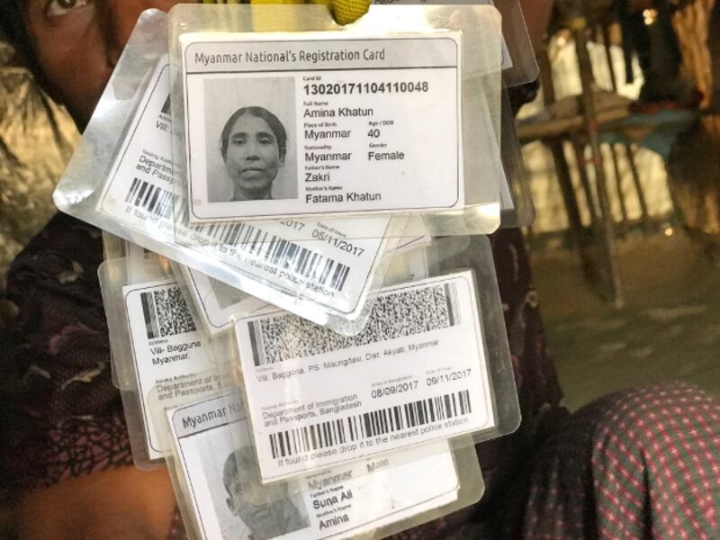 A Rohingya man holds identity cards Bangladesh issued to the Rohingya refugees upon their arrival in Cox's Bazar from Myanmar's Rakhine state, Jan. 21, 2018. [Kamran Reza Chowdhury/BenarNews] 