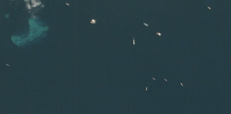Satellite imagery over Union Banks in the Spratly Islands shows Chinese fishing boats in an area not covered by the country's annual summer ban, May 10, 2020. [Planet Labs Inc.]