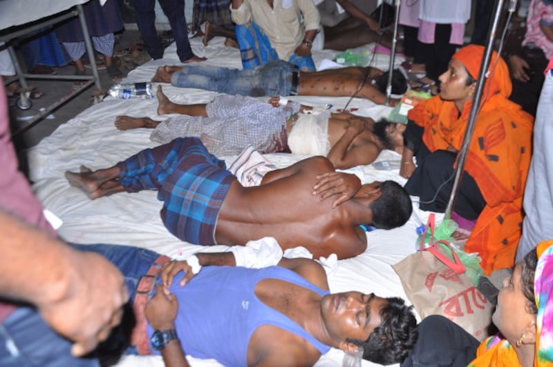 Demonstrators receive medical treatment in a hospital in the south-central Bangladesh city of Barisal after police said they opened fire in self-defense on demonstrators who were throwing rocks at officers, Oct. 20, 2019.