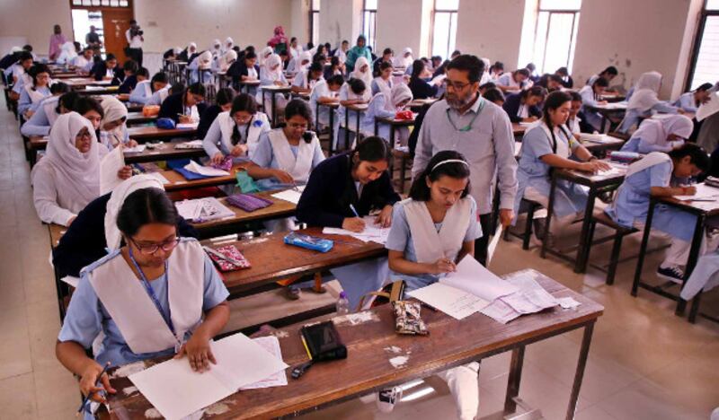 Bangladeshi students take their exams at a high school in Dhaka, Feb. 2, 2019. [BenarNews]
