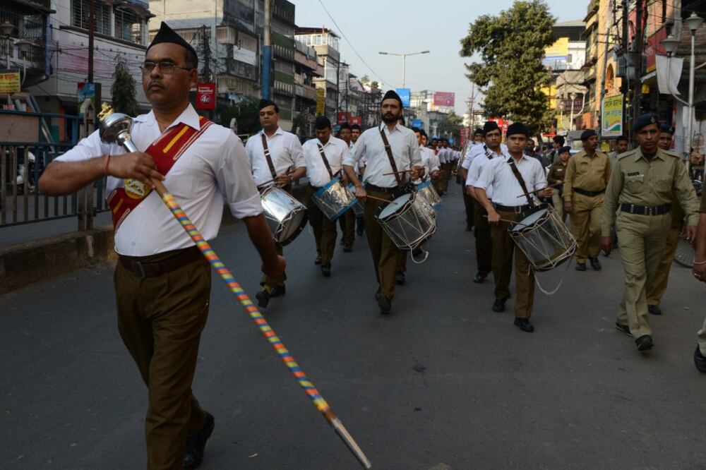 Volunteers with the Hindu nationalist Rashtriya Swayamsevak Sangh (RSS) march during an event marking the 121st birth anniversary of Indian nationalist Subhas Chandra Bose, in Siliguri, Jan. 23, 2017.