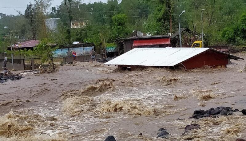 Residents walk near flooding in the eastern Philippine town of Guinobatan, Albay province, in the aftermath of Typhoon Goni, Nov 1, 2020. (Courtesy of AJ Miraflor)