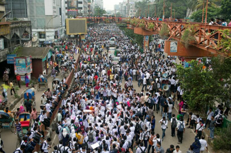 Bangladeshi students block a road during a protest that has largely cut off the capital Dhaka from the rest of the country, Aug. 4, 2018. (AP)
