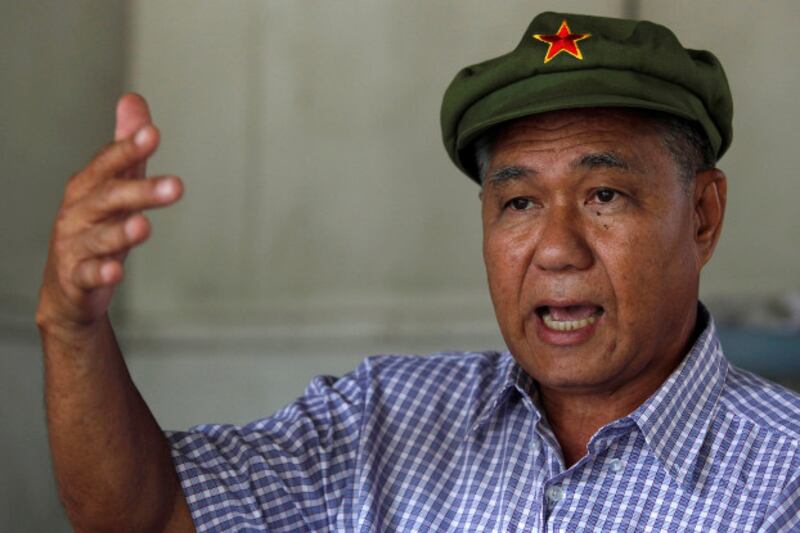 Former Thai communist leader Surachai Danwattananusorn gestures during an interview at his home in Bangkok, Aug. 25, 2010. (Reuters)