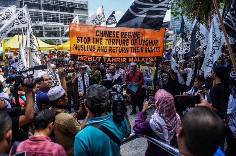 Members of Hizbut Tahrir Malaysia rally outside China's embassy in Kuala Lumpur to condemn the detention of Uyghurs in the Xinjiang region, Dec. 27, 2019. [S. Mahfuz/BenarNews]