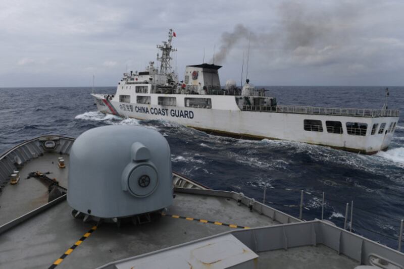 A Chinese Coast Guard ship is seen from an Indonesian Naval ship during a patrol in Indonesia's Exclusive Economic Zone near the Natuna islands, Jan. 11, 2020. [Antara Foto via Reuters]