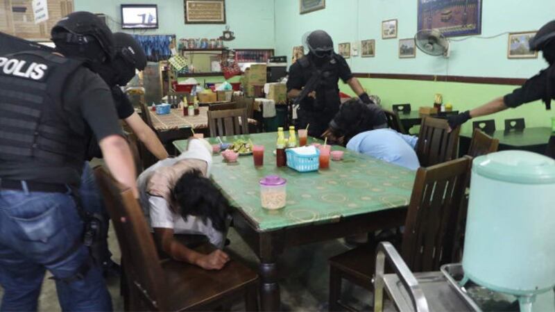 171017-MALAYSIA-RAID-inside2-620.JPG