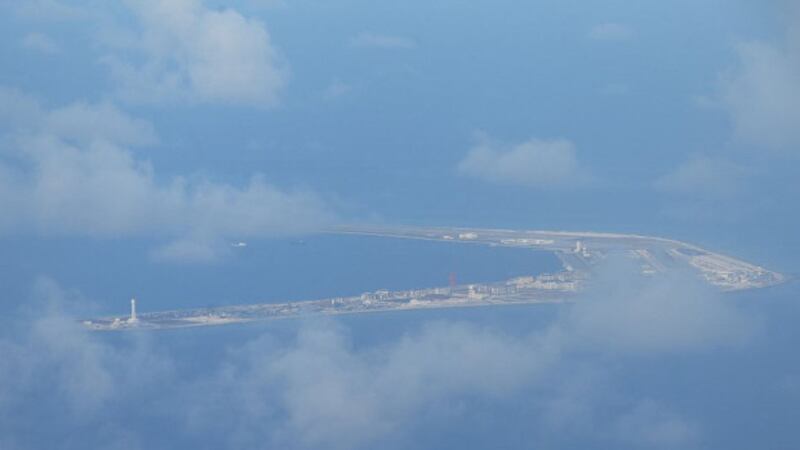An aerial shot of Chinese-claimed reef Subi reef, taken from a Philippine Air Force plane, April 21, 2017.