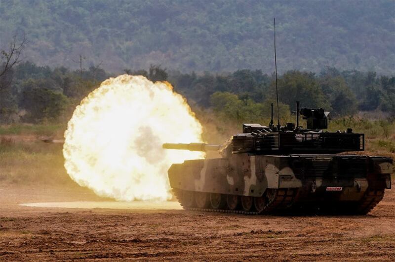 Thailand's Chinese-made VT-4 battle tank fires a round during a demonstration at Adisorn Cavalry Center in Saraburi province, Jan. 26, 2018. [Pimuk Rakkanam/BenarNews]
