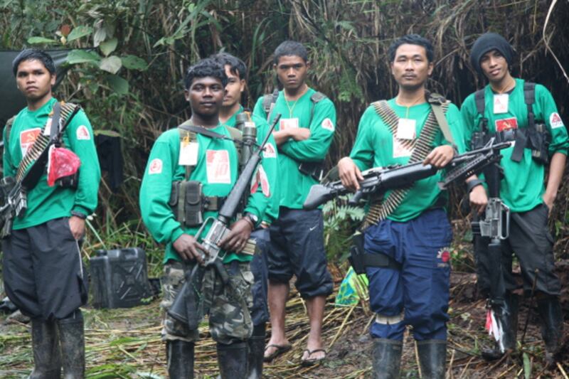 New People's Army guerrillas gather at an undisclosed camp somewhere in the southern Philippine island of Mindanao in 2011. (Dennis Jay Santos/BenarNews)